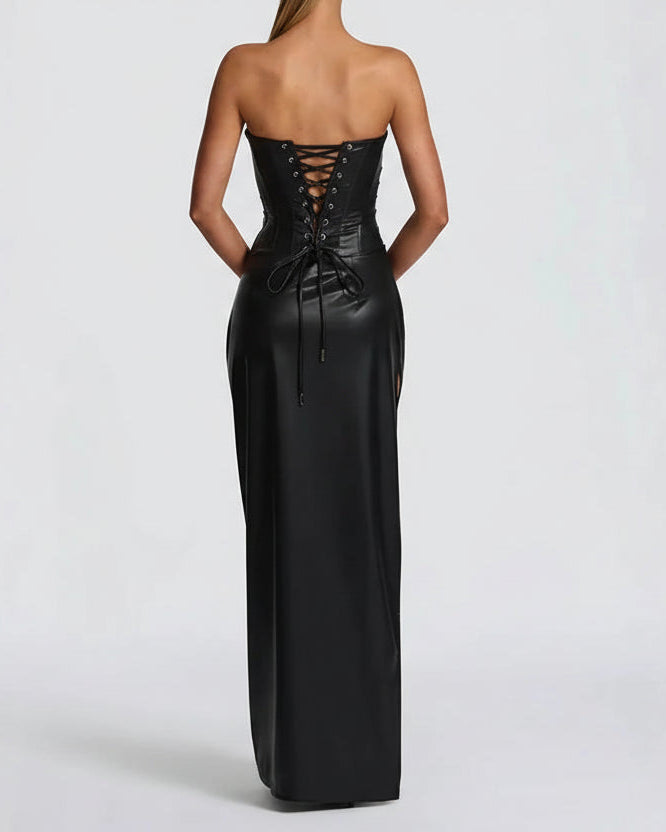 Black strapless gown with lace-up back on a white background
